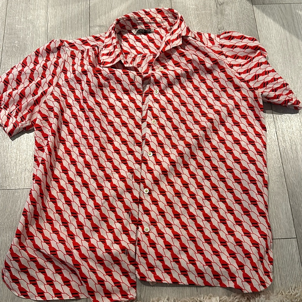 Women’s medium Hermes-Paris patterned button-down. Lightly worn.